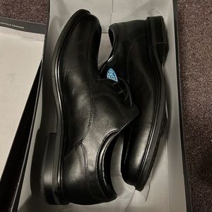 Men’s size 11 double-wide dress shoes, new in box with hydro-shield waterproof